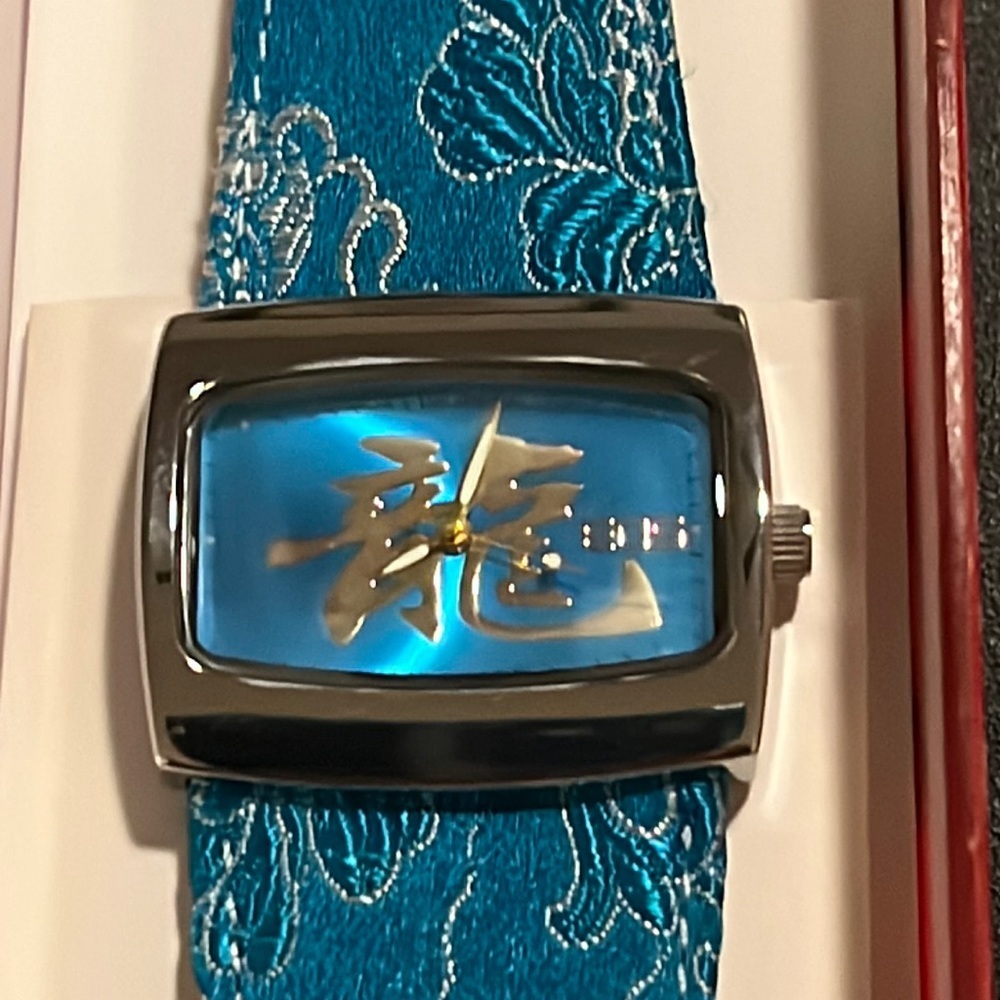 NWT EOS watch turquoise with dragon band